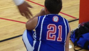 Ethan waits patiently to get into a basketball game